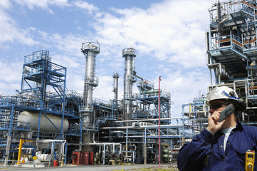 oil and gas worker inside refinery industry