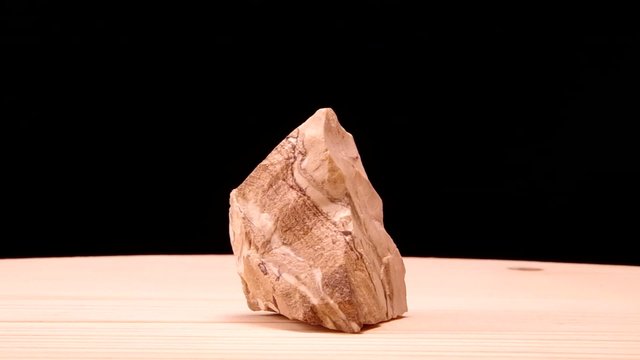 Jasper zebra raw mineral stone revolves on the board