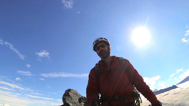 Peak Mountain climber filming himself trekking  Alaska, USA 