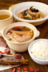 Chicken and herb soup in pot, Chinese food style