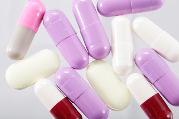 Macro shot of many colorful pills