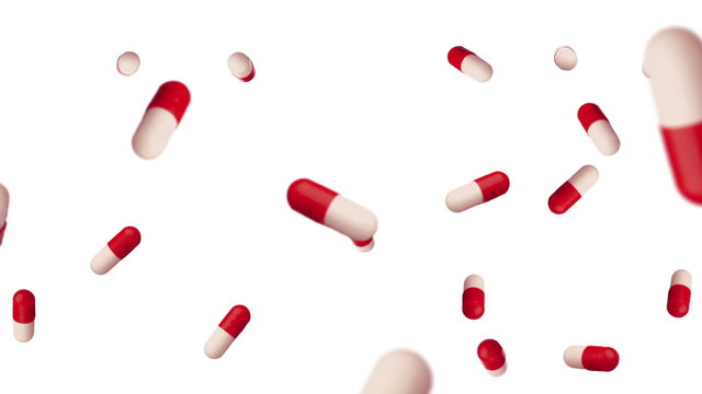 Two tone, medicine capsules raining down