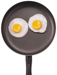 Fried eggs. Pan with handle on white background