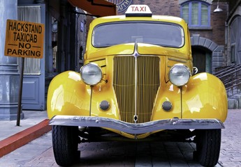 yellow vintage taxi