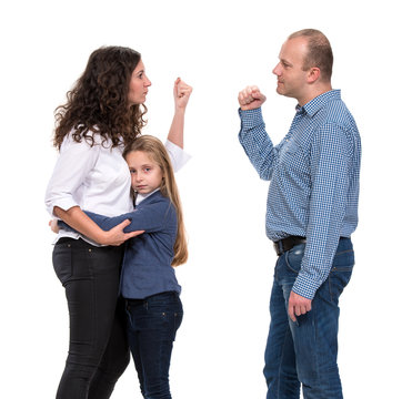 Sad looking girl with her fighting parents