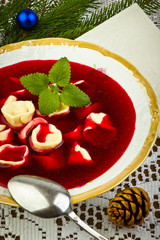 Traditional Christmas borscht with mushrooms filled in dumplings