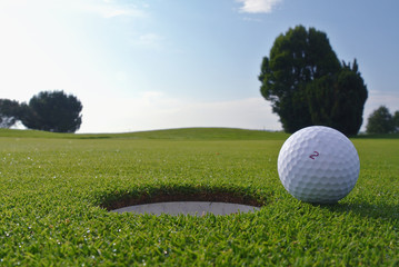 golf hole and ball