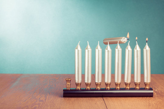 Hanukkah menorah with burning candles concept