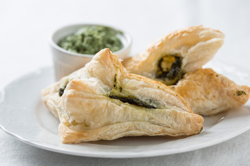 small pies stuffed with spinach