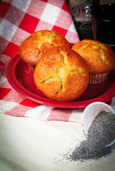 muffins and ingredients in background.