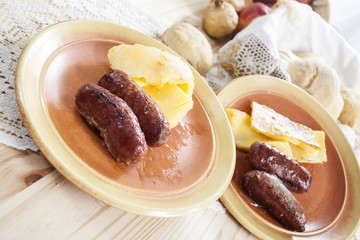 Salsicce di maiale e polenta