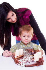 young women with a little boy with advent wreath