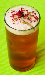 iced tea with ice cubes, on background