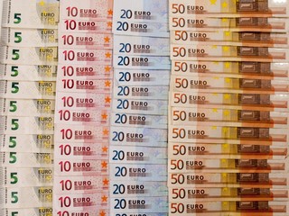 many euro banknotes as a background - 58055863