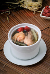 Fototapeta na wymiar Chicken and herb soup, Chinese food style.
