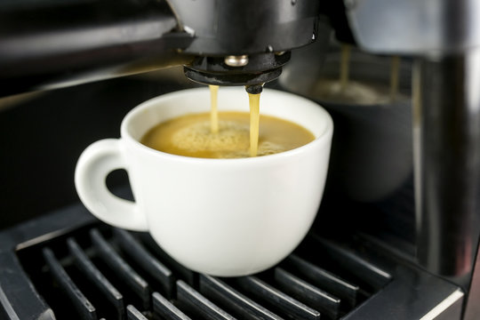 Machine making espresso