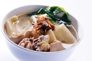 Chicken and herb soup in pot, Chinese food style