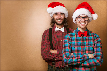 Two emotional Santa Claus  dressed in clothes hipster 