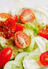 Vegetable salad with tomato, cucumber and salad