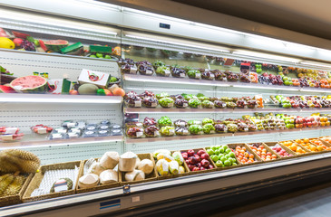 Shelf with fruits in supermarket