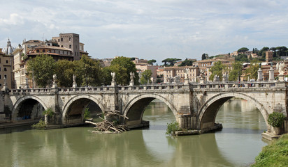 Fototapeta na wymiar Tiber River and Saint Angel Bridge seen from Castel San angelo