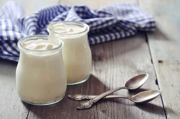 Fotobehang Greek yogurt in a glass jars © tashka2000
