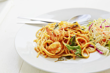 Spaghetti with shrimps,tomato and chopped parsley