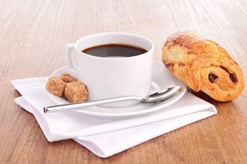 coffee cup and croissant