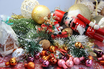 Fototapeta na wymiar Beautiful Christmas with toys, gingerbread and nutcracker