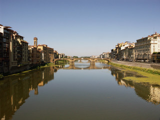 Fototapeta na wymiar Refleksje nad rzeką Arno