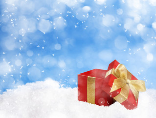 Christmas gift on winter background