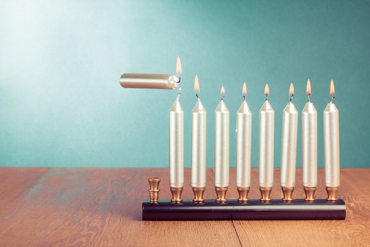 Hanukkah menorah with burning candles conceptual photo