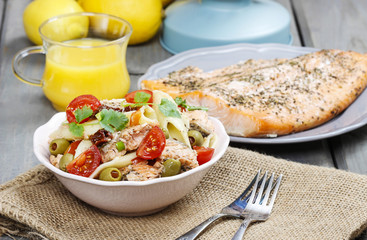 Salmon salad on wooden table