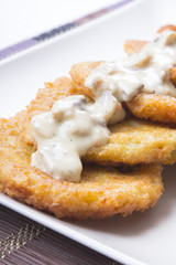 potato pancakes with mushroom sauce