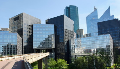 Modern buildings in the business district of La Defense to the w
