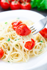 Spaghetti with roasted tomatoes and herbs