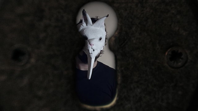 Maniac with a scary mask grabs you slow keyhole