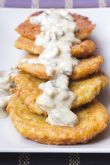 potato pancakes with mushroom sauce