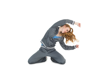 Young woman in sportswear stretching