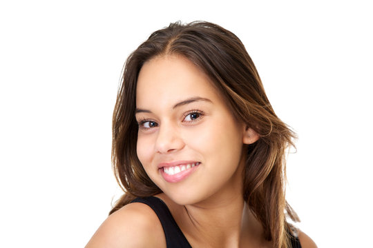 Portrait of a cute girl smiling on isolated white background