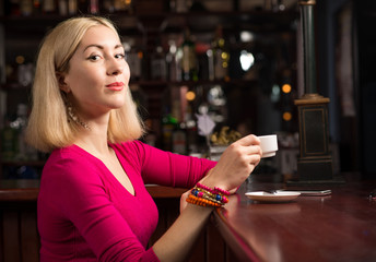 woman with a cup of coffee