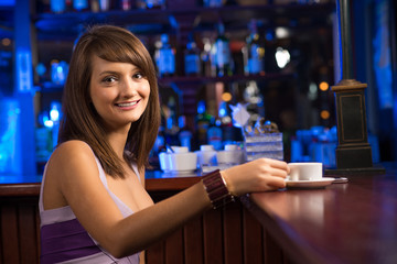 woman with a cup of coffee