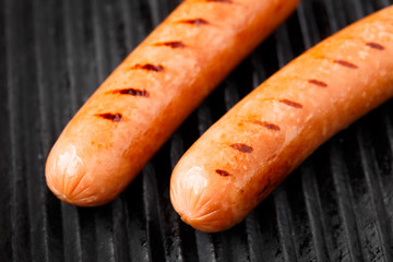Sausages on a grill