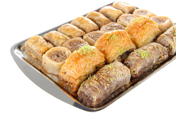 Sweet baklava on tray isolated on white