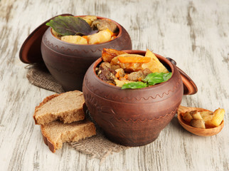 Homemade beef stir fry with vegetables in pots