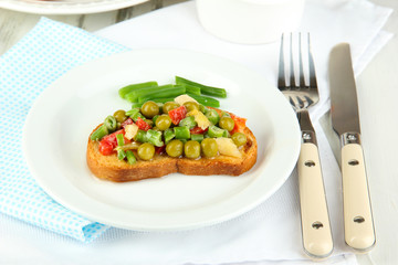 Sandwich with vegetables and greens