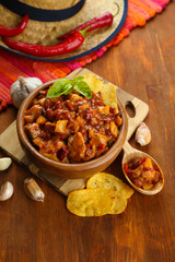Chili Corn Carne - traditional mexican food, in wooden bowl,