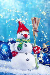 Beautiful snowman and Christmas decor, on bright background