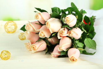 Beautiful bouquet of roses, on light background
