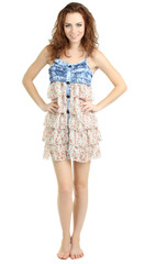 Beautiful young girl in dress isolated on white